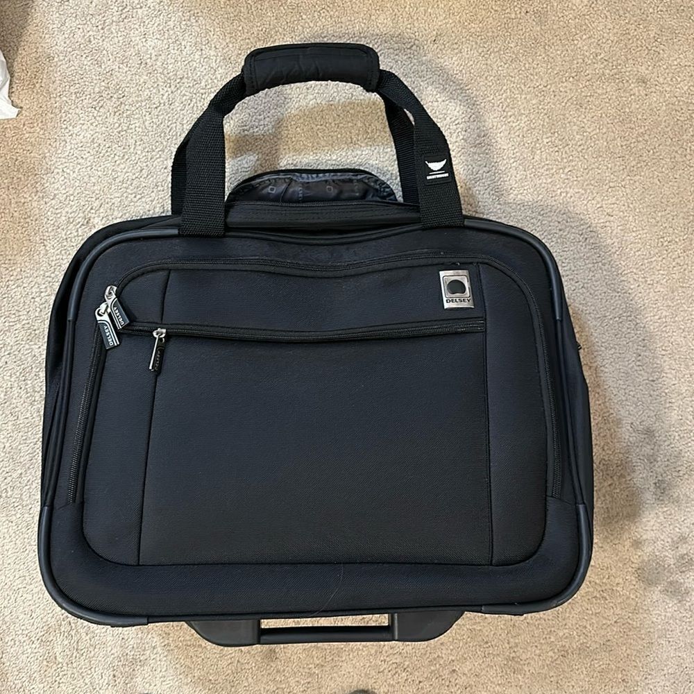 New Delsey rolling laptop luggage. Black